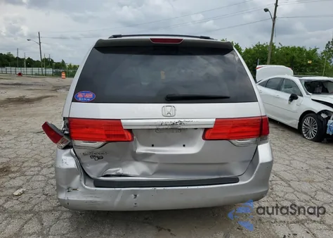 2010 Honda Odyssey Exl z USA, uszkodzony, nr VIN 5FNRL3H79AB007842